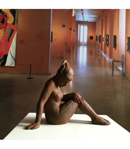 Sculpture act of naked woman in rusty bronze