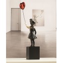Girl with red balloon