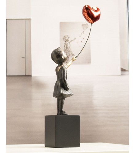 Girl with red balloon