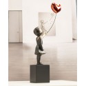 Girl with red balloon