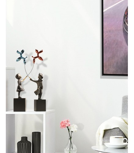 Girl with balloon dog