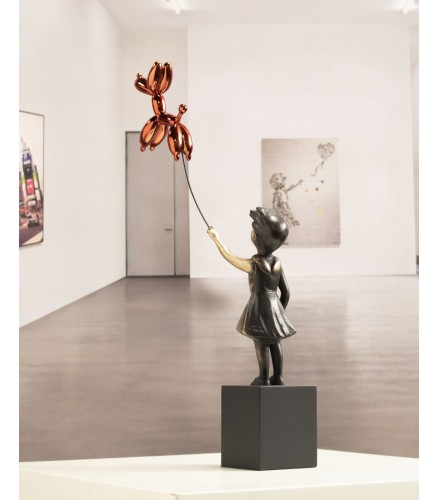 Girl with balloon dog