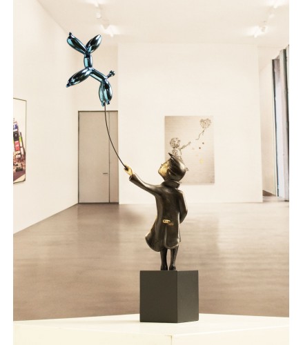 Child with balloon dog