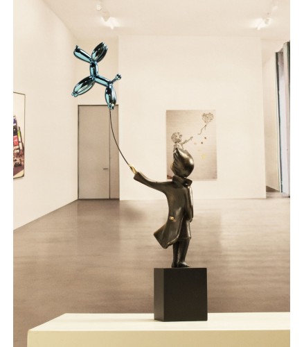Child with balloon dog