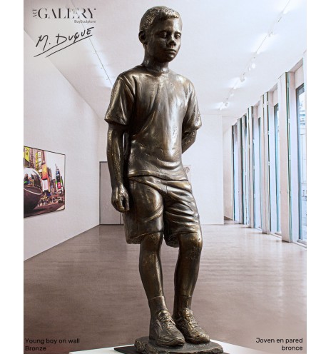 Young boy on wall